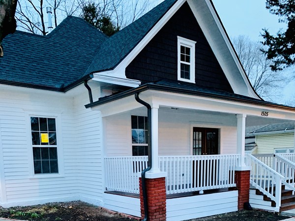 Live the farmhouse lifestyle in the heart of downtown Blue Springs. Charming