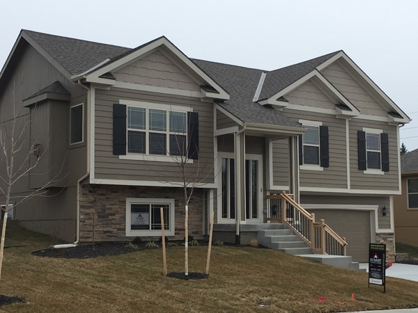 Gorgeous new model split level in The Meadows of Chapman Farms by Summit Homes