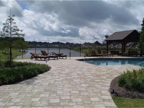 University Villas pool boasts a great lake view while you swim