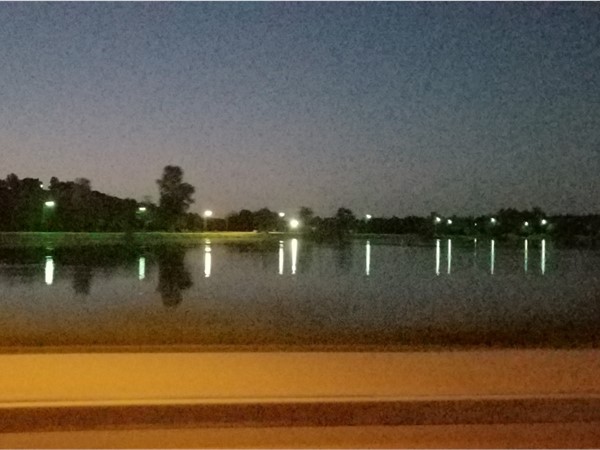 A good night to walk along the Spiro City Lake walking path