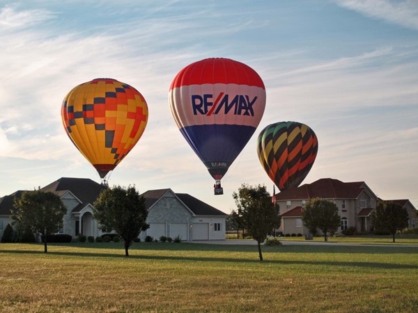 Soft landing for the RE/MAX ballloon near a private airstrip