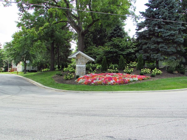 Eastern entrance marker with lush landscaping