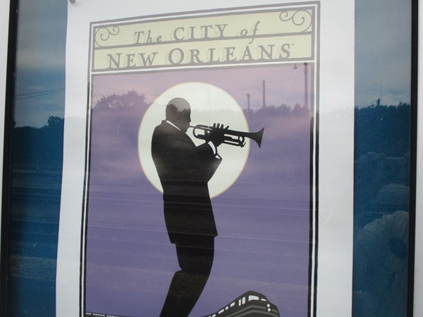 The only name for a train that travels between Chicago and New Orleans. "City of New Orleans"