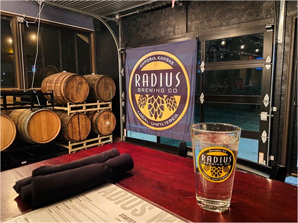 Inside of Radius Brewing Company in the back seating area. Amazing food and drinks here