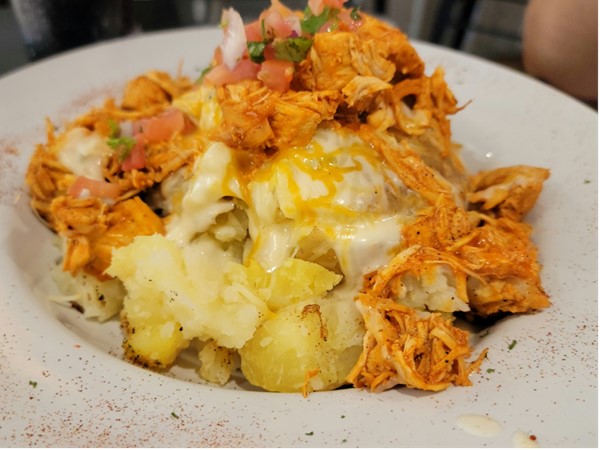 Buffalo Chicken Smashed Potato, served at The Scratch Kitchen. One of many delectable choices here. 