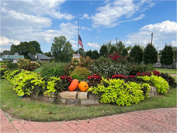 Entrance to Historic Downtown Springdale is exquisitely landscaped and ready for fall