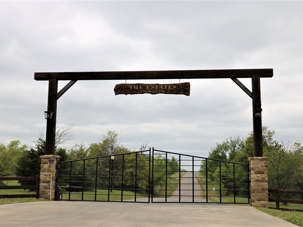 Love this rustic grand entrance at The Estates of Southwind Hills  