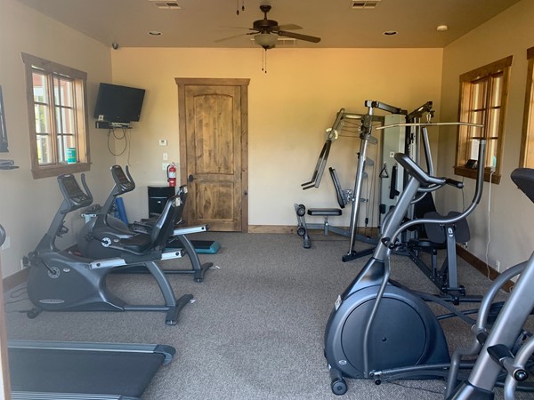 Iron Horse Ranch Gym, two treadmills, two bikes, two elliptical's, three TV's, dumbbells, and more