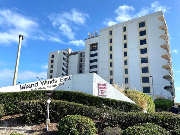 Island Winds east entrance with condo behind it