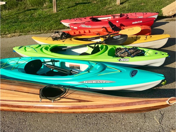 A rainbow of kayaks ready for fun on Lake Remembrance