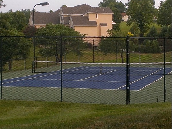 Meticulously manicured tennis facility for Bent Oaks residents and guests