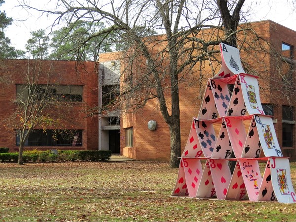 A student-designed sculpture of playing cards outside the Fine Arts Building at UALR