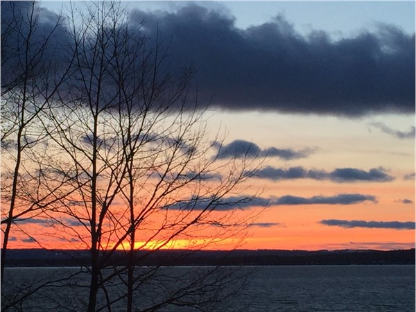 Appreciating the beauty of Traverse City and East Bay as the sun sets over Old Mission Peninsula