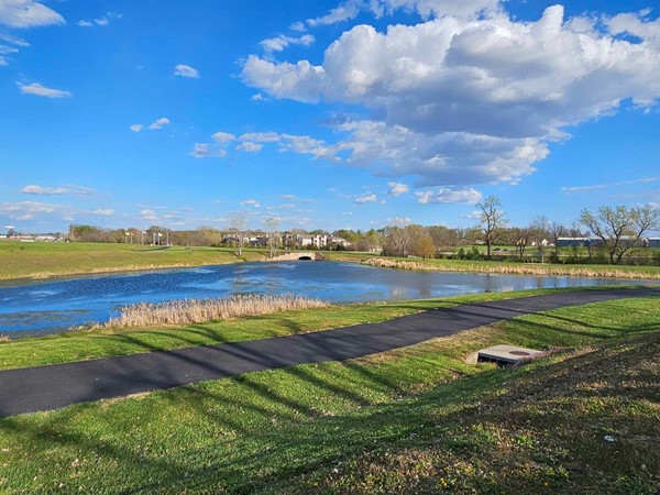 Scenic 0.8-mile loop around a 10-acre lake in Grain Valley - perfect for walking, biking, & fishing!