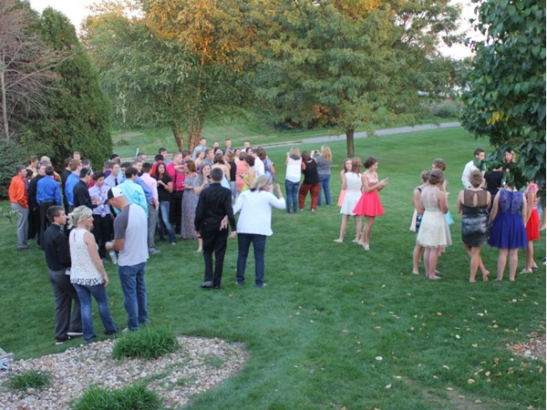 My son's classmates gather before West Dubuque High Schools Homecoming for a pre-event meal