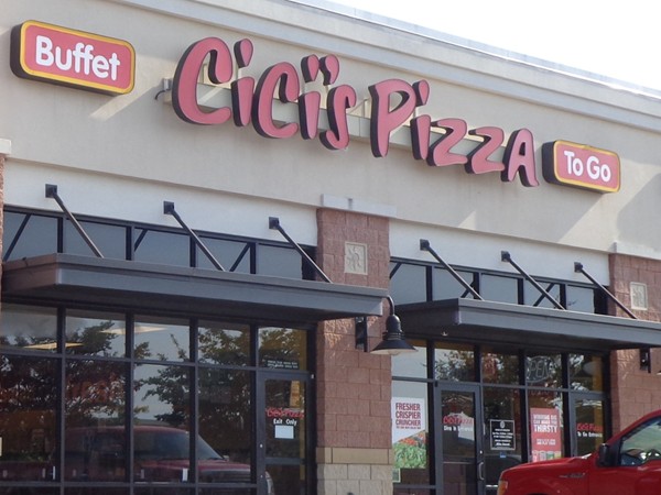 CiCi's Pizza has a large pizza buffet and you can even get it to go