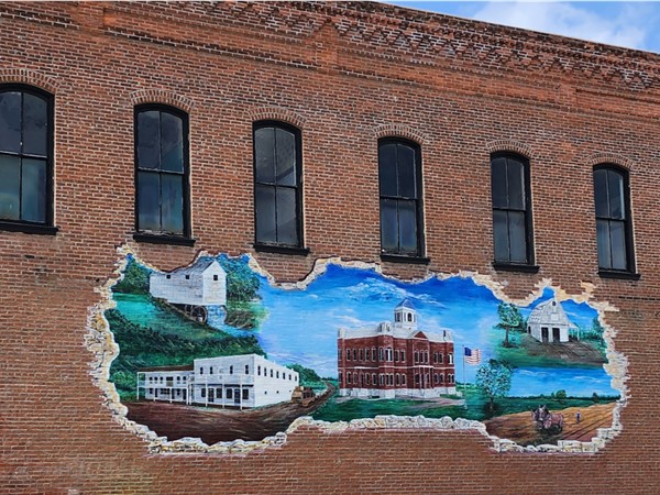 Beautiful mural in downtown Versailles depicts the richness of Morgan County history 
