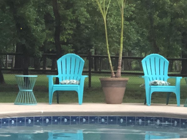 Relax by the pool in this unique gated community.  You will think it’s country living, right in town