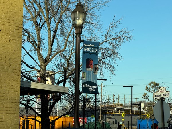 Just love the charm of the street lights and the welcome flags in Downtown Rogers, AR