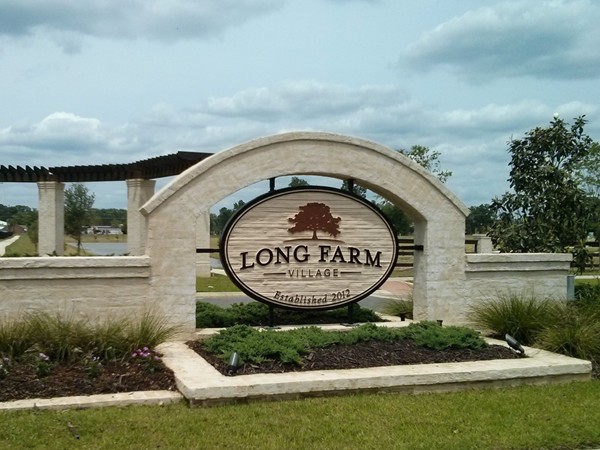 Entrance to Long Farm Village off Barringer Foreman Road and Airline Highway