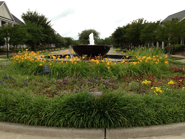 Louisanne Subdivision has a beautiful fountain in the center of a beautiful traffic circle