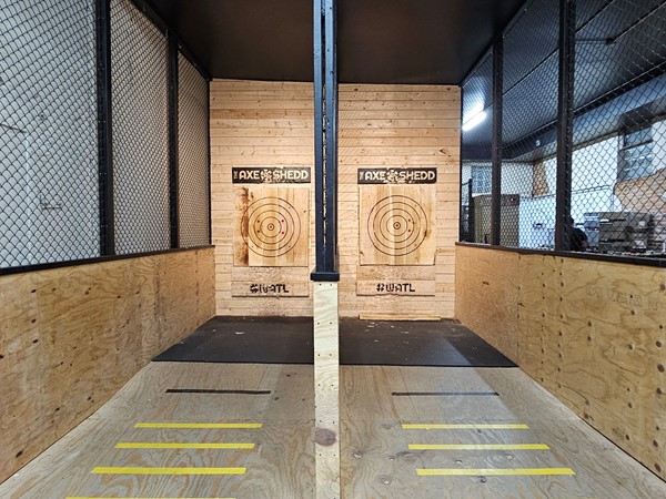Axe throwing lanes at The Axe Shedd, featuring WATL targets