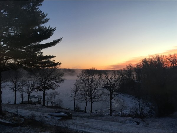 Frigid temperatures have the lake frozen at the 77mm of the Lake of the Ozarks at sunrise