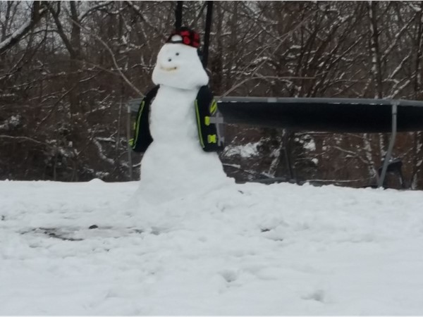 Even the snowmen at the lake understand the importance of a life jacket