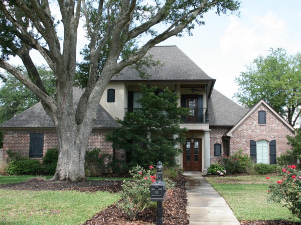 Another beautiful home set among the mature oak trees in the heart of the city