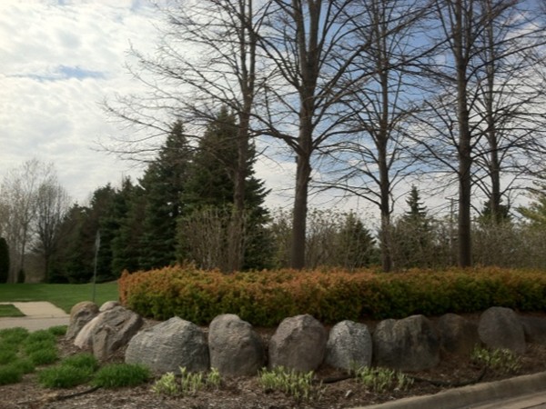 Sherwood Hills Development entryway in early spring