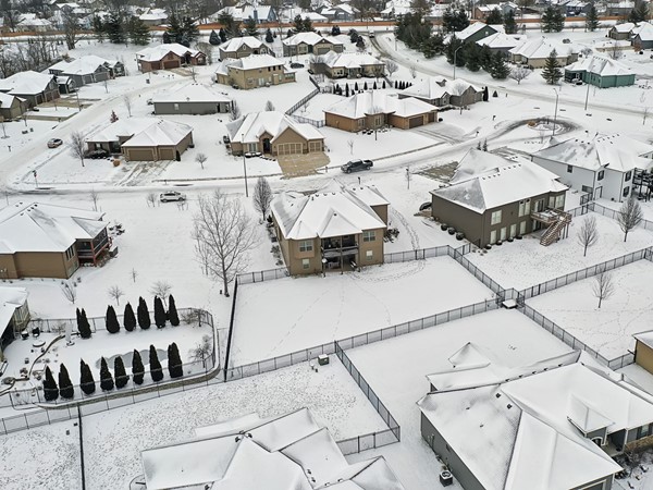 Snow covered aerial of this beautiful subdivision