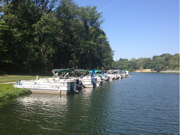 Pontoon boats waiting for someone to jump aboard to cruise the 274 acre lake.