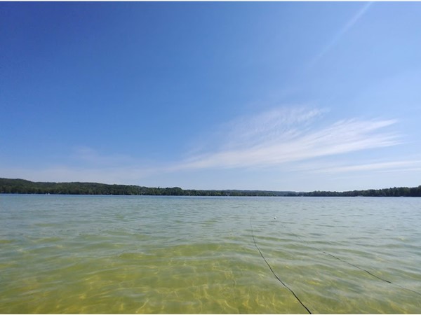Paddle board six miles on North Lake Leelanau, then picnic on the sandbar for an awesome day