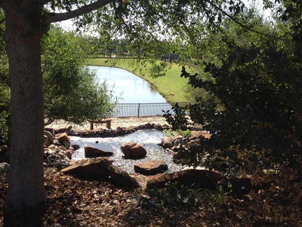 Lovely view of the large water feature is at the entrance to Highland Village
