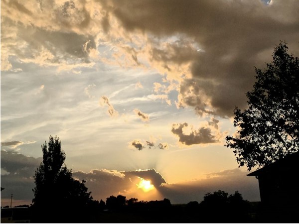 A stunning sunset breaks up storm clouds over Wardsville