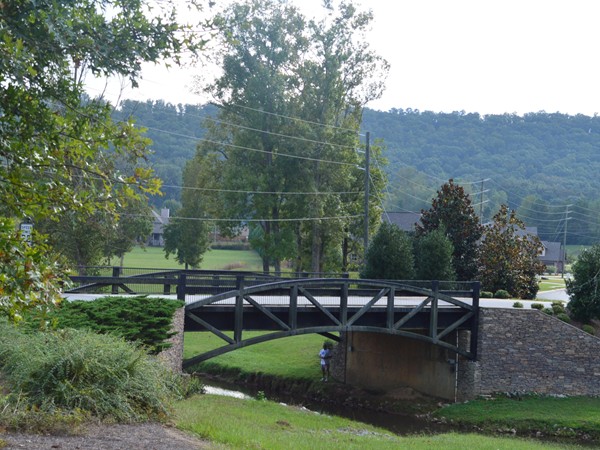 Historic style bridge leading into Legacy Springs