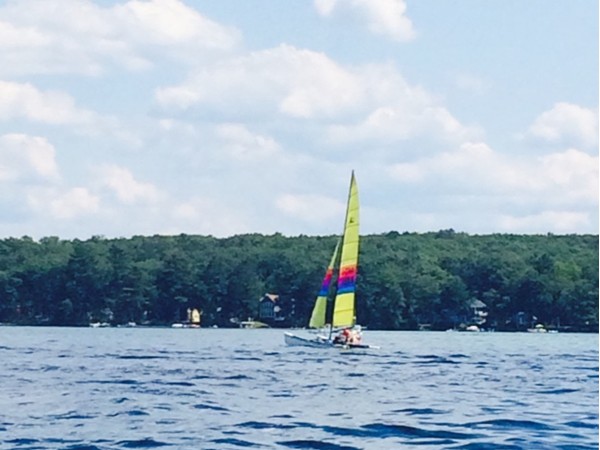 Sailboat with a splash of color on Higgins Lake 