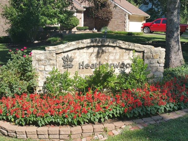 Heatherwood sign at the entrance, welcoming you to this beautiful neighborhood