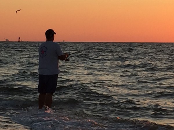 Fun fishing and beautiful sunsets at the tip of Fort Morgan