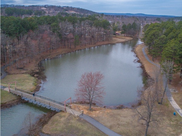 Aerial view of the smallest body of water at Lake Willastein, surrounded by paved trails