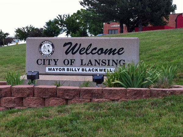Welcome to Lansing, sign at City Hall, 