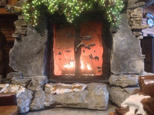 Sitting by the fireplace at Bass Pro Shop in Independence