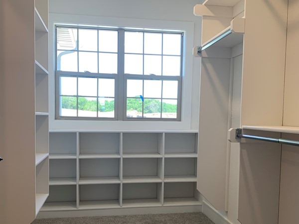 All kinds of space and cubbies in the Master closet and the laundry room connects