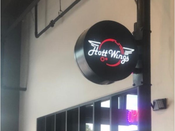 The first place to open in Edmond's newest business area is Hott Wings. Come check out everything 