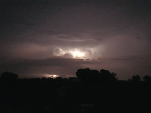 Lightening in a summer thunder storm over Highridge Manor 