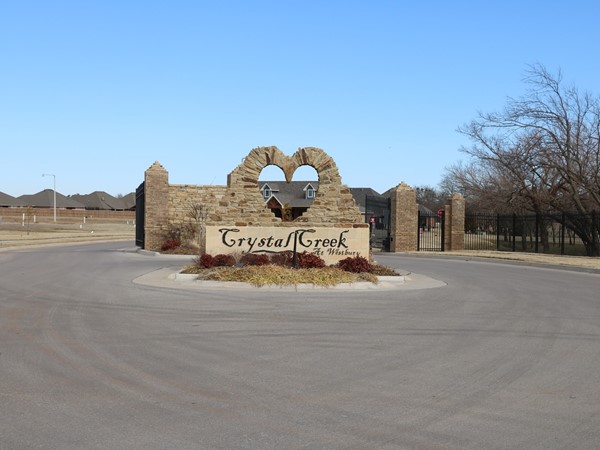 Heart shaped gated entrance of Crystal Creek at Westbury located off SW 29th Street 