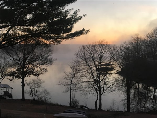 Sunrise with steam rising off the lake at the 77mm of Lake of the Ozarks