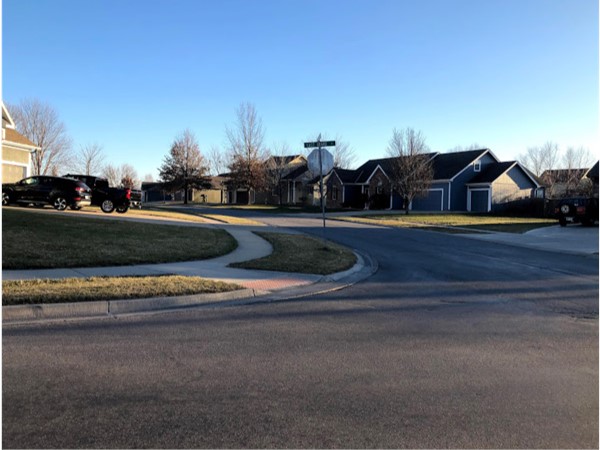 The clean and well-maintained neighborhood of Plum Creek Estates