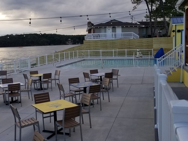 Outdoor seating and lower pool areas at LandShark Bar & Grill