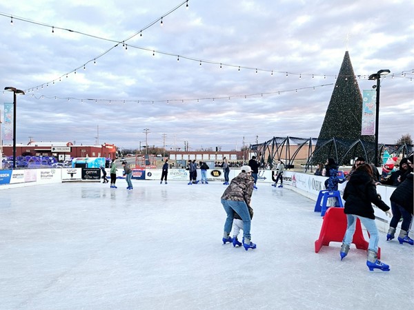 Is there anything more quaint than ice skating next to a giant Christmas tree during the holidays?